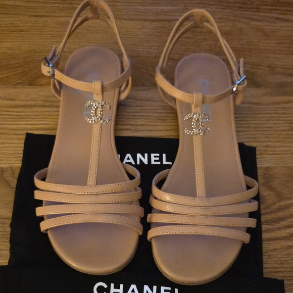 CHANEL Shoes - CHANEL Tan Lambskin Sandals with Intertwined Leather And Metal CC LOGO
